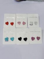 Pack X 12 pares Aros Acero Quirúrgico Plateado de forma corazón con strass